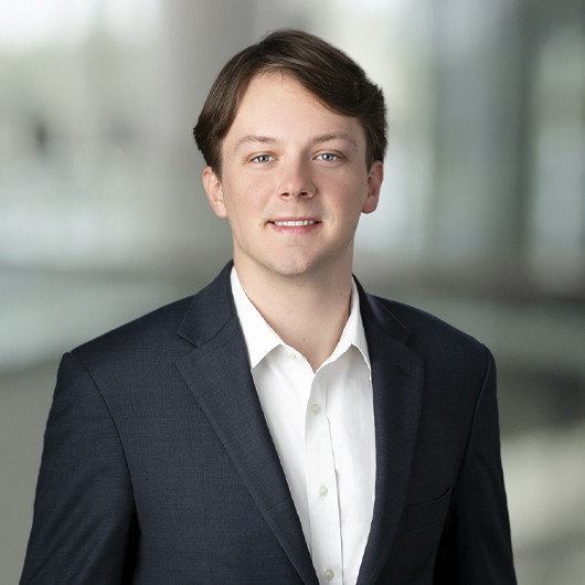 Headshot photo of Trevor Melehan