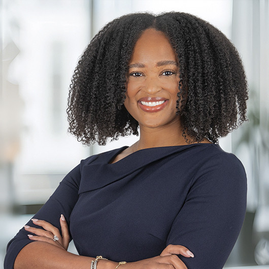 Headshot photo of Kenia Washington